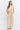 Women's natural linen-blend two-piece set featuring an embroidered sleeveless crop top with scalloped detailing and matching wide-leg drawstring pants.
