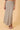 Women’s brown and cream gingham maxi skirt with a slim silhouette and softly flared hem.