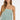 Women’s sage green satin strapless top with delicate floral lace trim and a relaxed silhouette.
