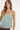 Women’s sage green satin strapless top with delicate floral lace trim and a relaxed silhouette.