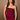 Women’s burgundy strapless fitted top with tonal sequin trim along the neckline and hem.