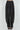 Women’s black high-waisted pleated barrel-leg pants with slim belt and gold buckle.