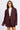 Women’s burgundy pinstripe oversized blazer with notched lapels, button front and flap pockets.