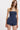 Woman wearing a navy strapless top and shorts set on a white background